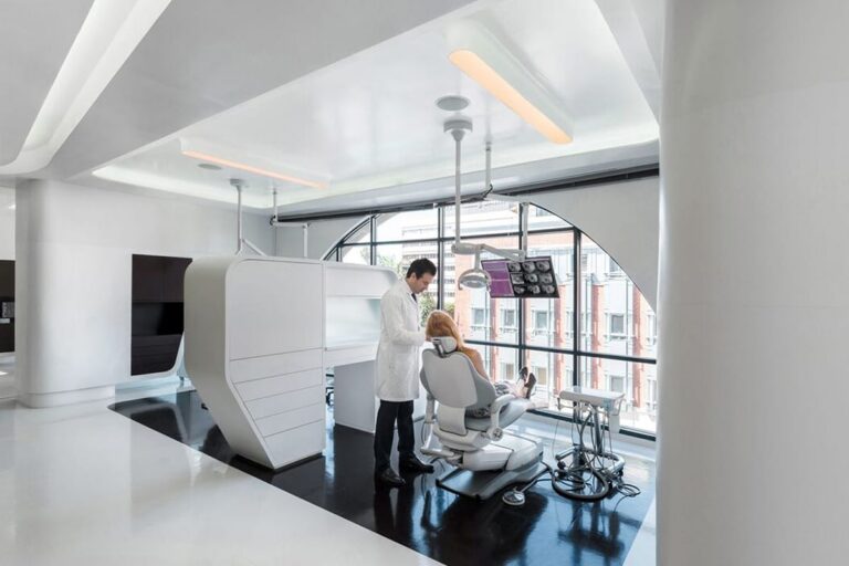 Treatment bay at Bedford Dental Group, below the arched windows